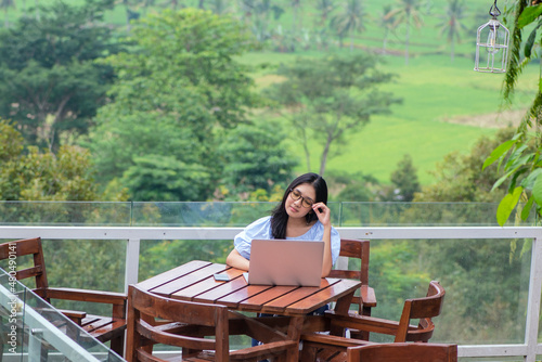 College Student Using Laptop, Outdoor.
