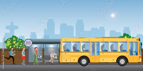 Passengers at the bus stop on city view.
