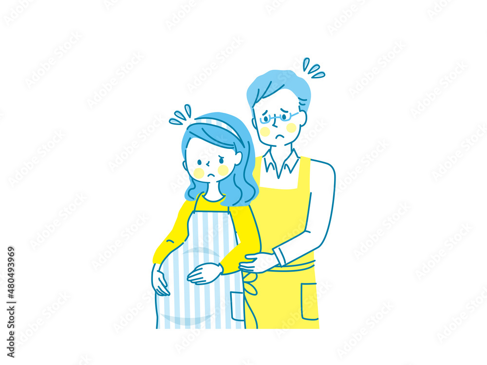 お腹の中の赤ちゃんを心配する妊婦と寄り添う夫 お腹の中の赤ちゃんを心配する妊婦と寄り添う夫