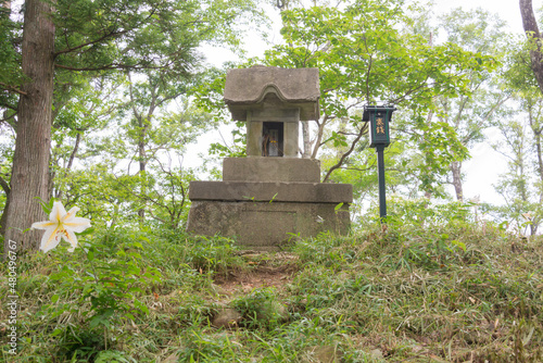 Iwate, Japan - Jul 21 2017: Shrine at Summit of Mount Kinkei (Kinkeizan) in Hiraizumi, Iwate, Japan. It is part of Historic Monuments and Sites of Hiraizumi, a UNESCO World Heritage Site. photo