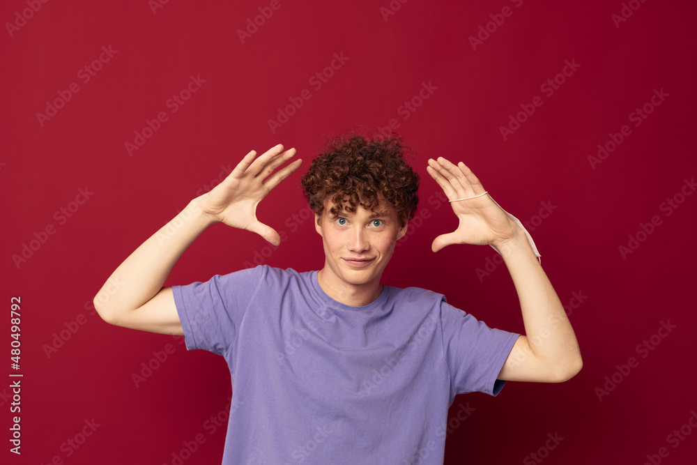 Redhead guy with curly hair posing gesture with hands Redhead guy with curly hair posing gesture with hands