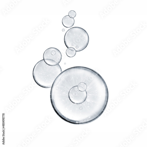 water miracle bubble or cosmetic liquid serum drops on white background. Beauty and skincare