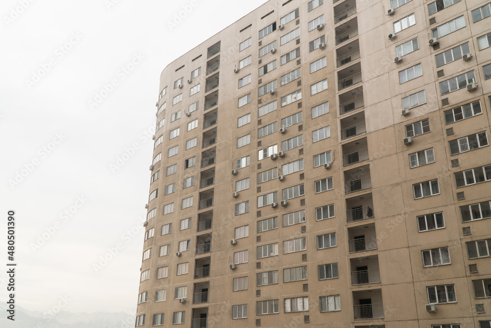 Facade of a modern multi storey residential complex. Urban architecture Facade of a modern multi storey residential complex. Urban architecture