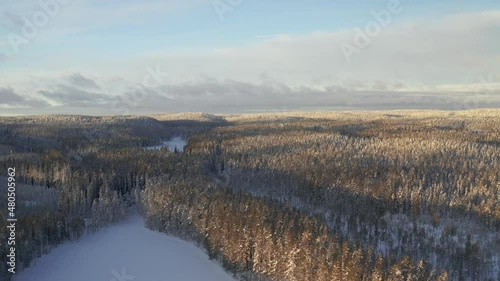 Aerial view of the landscape of Hiidenportti National Park in winter in Sotkamo, Finland. View from south end towards north-west. photo