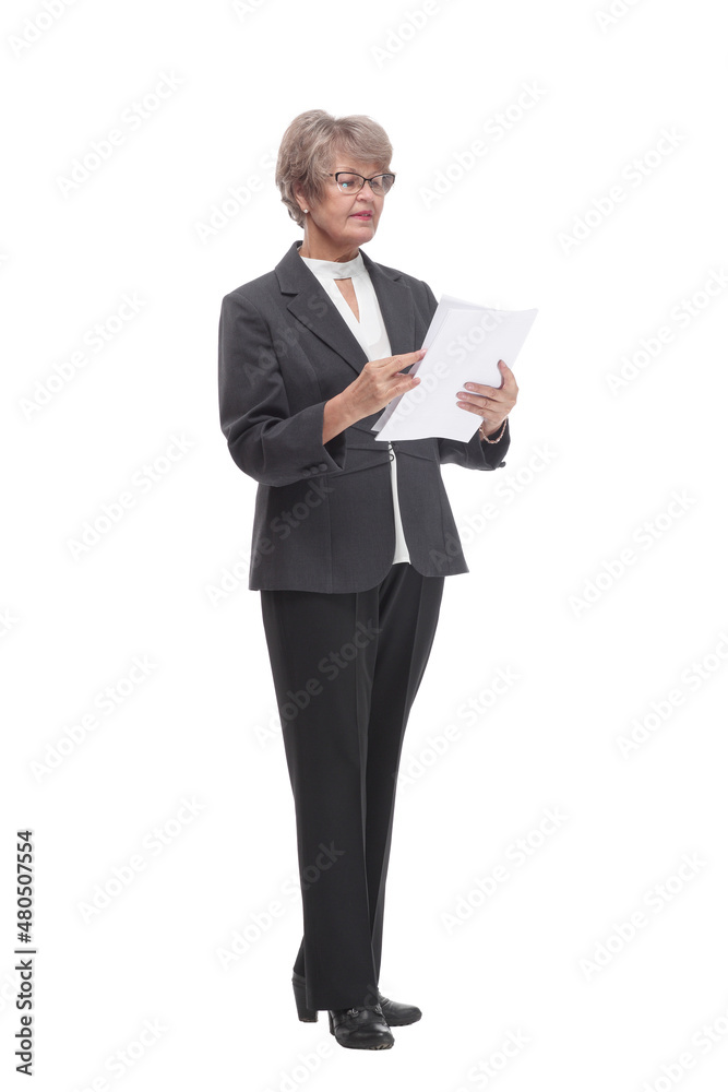 Portrait of a mature attractive stylish woman retired with a cup of coffee and a smartphone in her hand Portrait of a mature attractive stylish woman retired with a cup of coffee and a smartphone in her hand