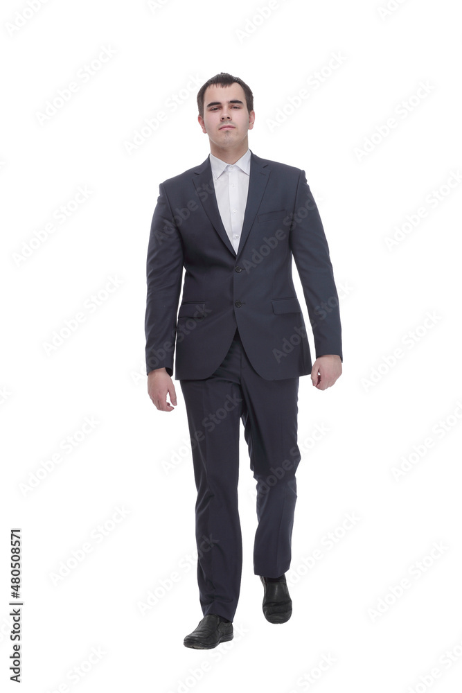 Happy businessman in black suit walking in front of the camera Happy businessman in black suit walking in front of the camera