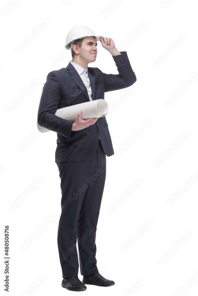 Front view of young architect man in hardhat holding blueprints walking away Front view of young architect man in hardhat holding blueprints walking away
