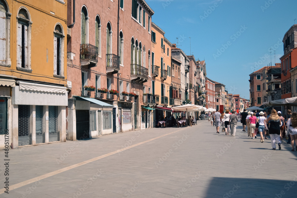 old italian street in Venice. historic view and architecture, summer day