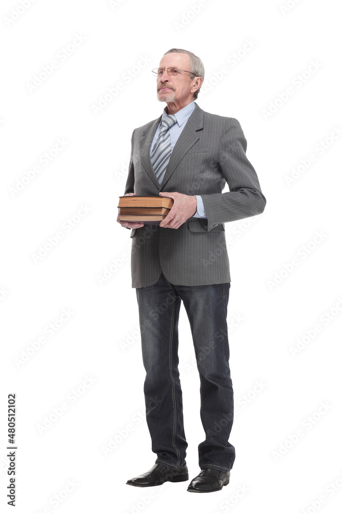 Portrait of middle-aged man in suit holding heap of books Portrait of middle-aged man in suit holding heap of books