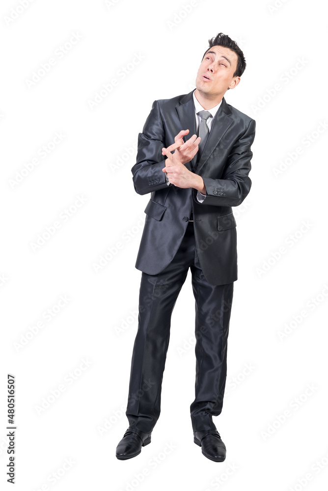 Businessman counting on fingers in studio Businessman counting on fingers in studio