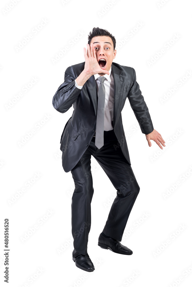 Businessman announcing news and shouting in studio Businessman announcing news and shouting in studio