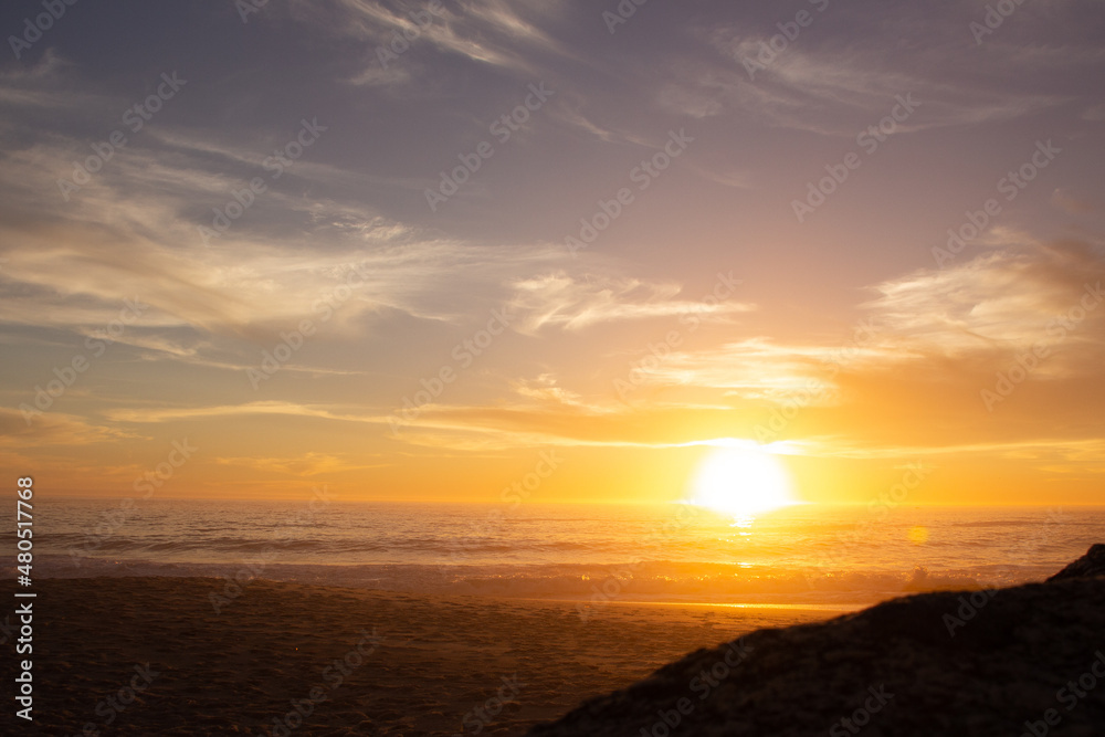 Golden sunset over the ocean taken from Clifton Fourth Beach, Cape Town, South Africa. Golden sunset over the ocean taken from Clifton Fourth Beach, Cape Town, South Africa.