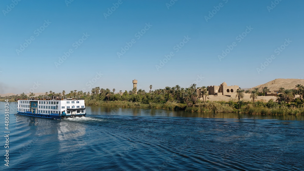 Picture of a retro-style cruise boat on a river Nile