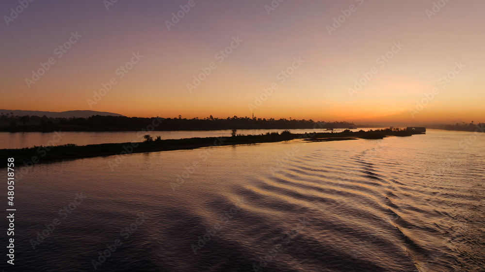 Serene view of the beautiful sunset from the boat on the river Nile