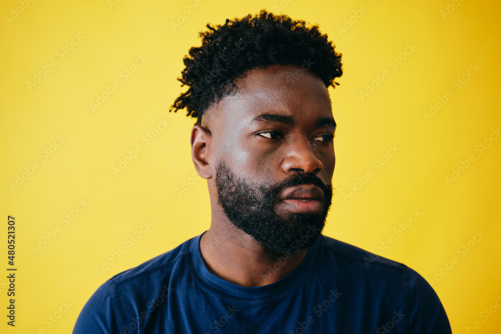 Handsome Afro Man With Hand On Beard Handsome Afro Man With Hand On Beard