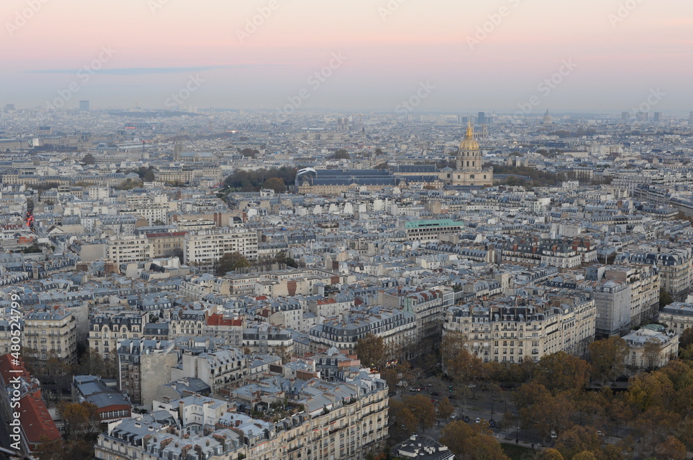 Aerial view and panorama of Paris, the capital of France before dusk