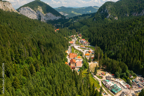 Beautiful Romania. Aerial view of Lacu Rosu mountain resort. There is an amazing lake, called Red Lake, between the mountains.