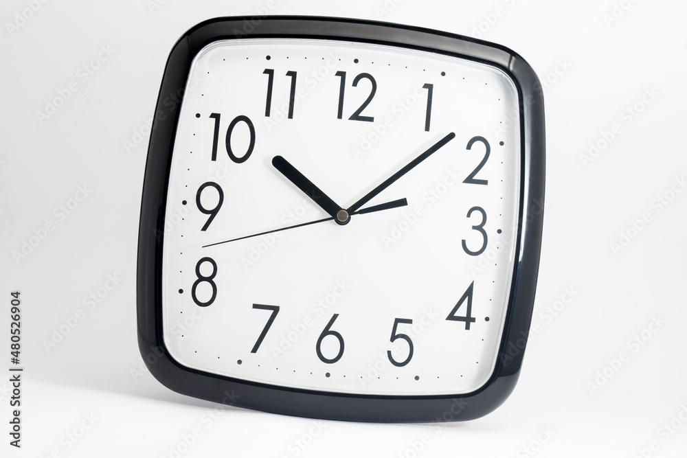 Black classic clock on isolated white background. Black classic clock on isolated white background.