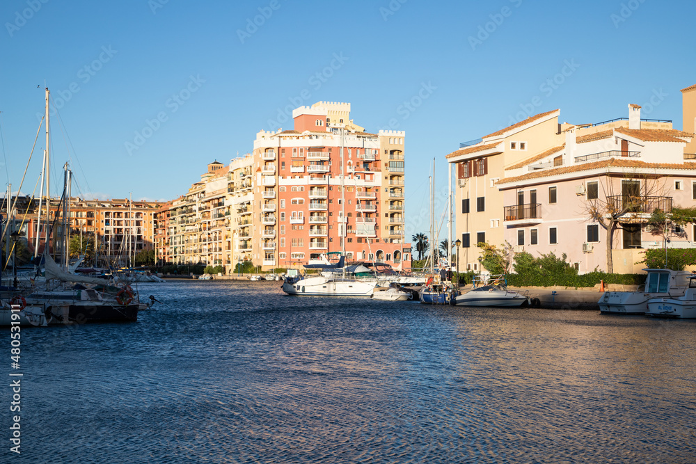 VALENCIA , SPAIN - DECEMBER 8, 2021: traditional buildings of Port Saplaya  the Little Venice near Valencia  Spain