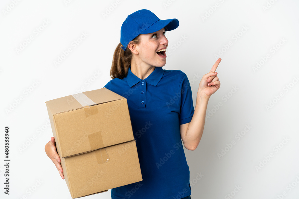 Young delivery woman isolated on white background intending to realizes the solution while lifting a finger up Young delivery woman isolated on white background intending to realizes the solution while lifting a finger up