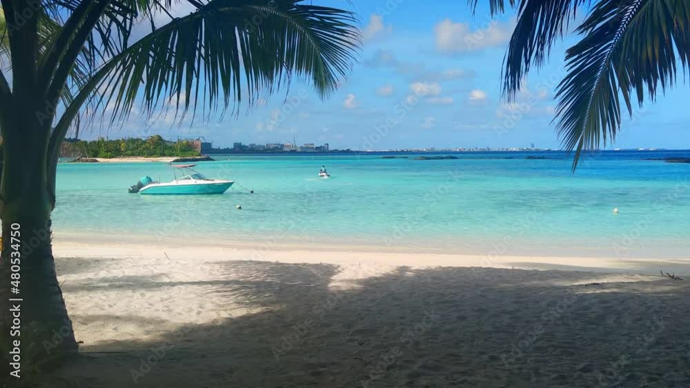 Beach landscape. Sandy Beach with boat in the Maldives. Beach landscape. Sandy Beach with boat in the Maldives.