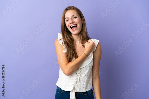 Young caucasian woman over isolated background celebrating a victory