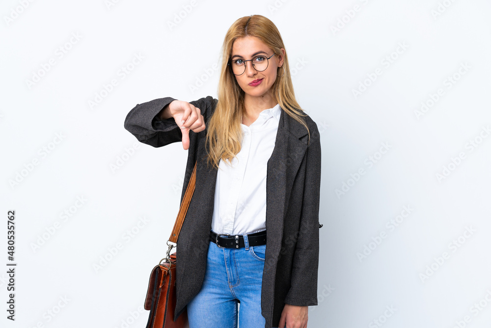 Fototapeta premium Business Uruguayan woman over isolated white background showing thumb down sign