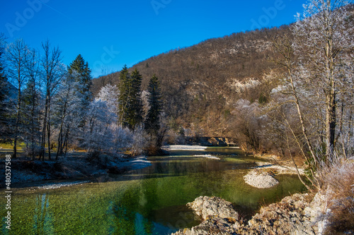 Fototapeta Naklejka Na Ścianę i Meble -  Winter morning on the lake. Triglav National Park. Julian Alps in Slovenia, Europe