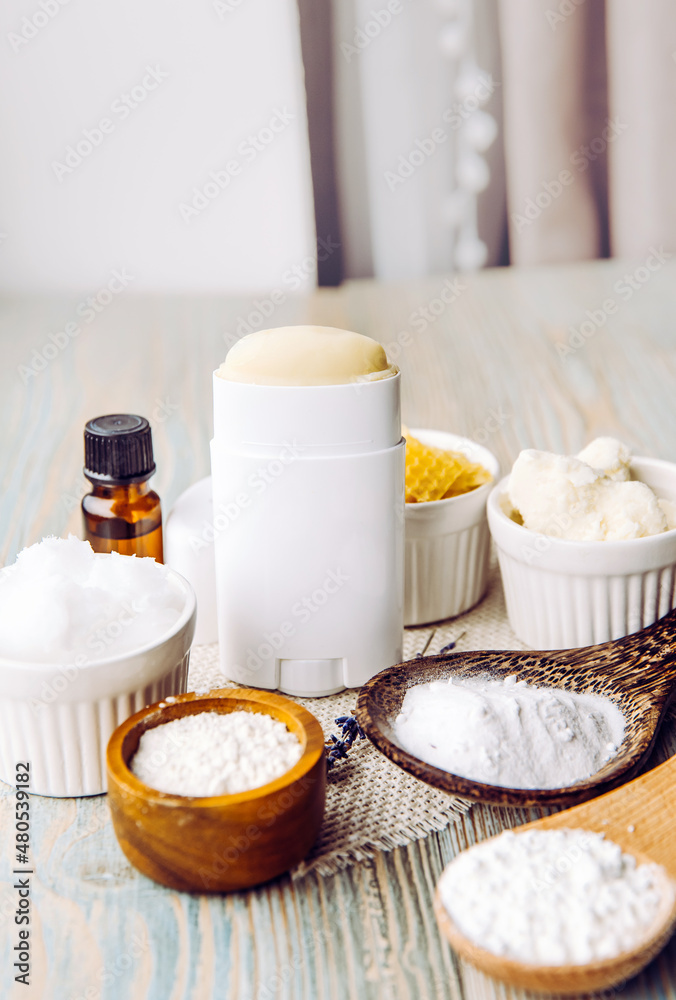 Making homemade deodorant stick with all natural ingredients concept.  Wooden background. Ingredients: arrowroot powder, baking soda, beeswax,  shea butter, essential oil, cornstarch, coconut oil. Stock Photo | Adobe  Stock