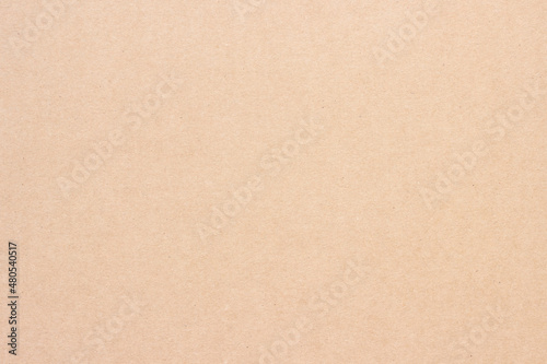 A sheet of brown cardboard. Paper natural texture. © Сергей Рамильцев