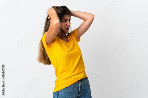 Young caucasian woman isolated on white background stressed overwhelmed