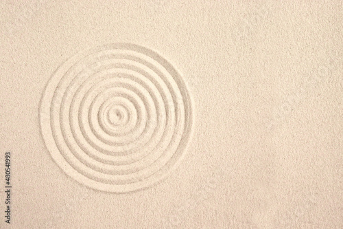 A circle in the sand. Zen Japanese garden. Background.