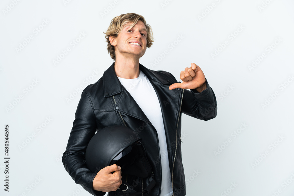English man holding a motorcycle helmet proud and self-satisfied English man holding a motorcycle helmet proud and self-satisfied