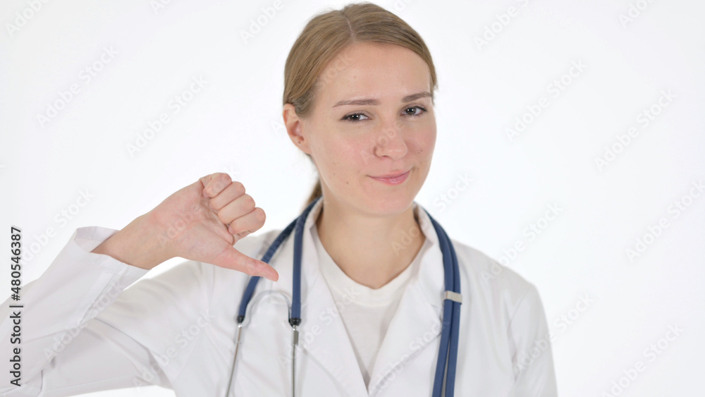 Thumbs Down Gesture by Female Doctor on White Background Thumbs Down Gesture by Female Doctor on White Background