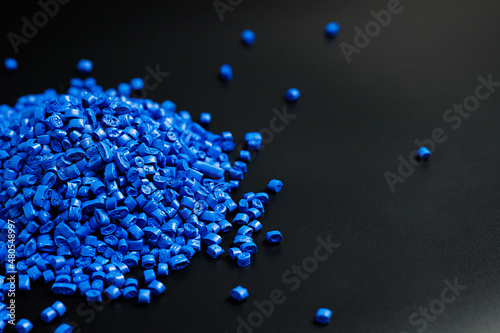 blue granules of polypropylene, polyamide. Background. Plastic and polymer industry. Microplastic products.