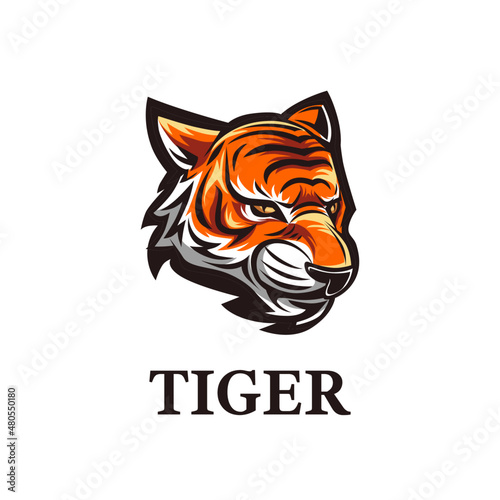 Fototapeta Naklejka Na Ścianę i Meble -  Tiger Logo Mascot Stealth Mode Orange Color This logo is very suitable for teams, communities, groups, sports, basketball, soccer, rugby, and also for clothes, t-shirts, jackets