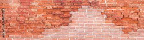 Red brick wall as panorama background texture