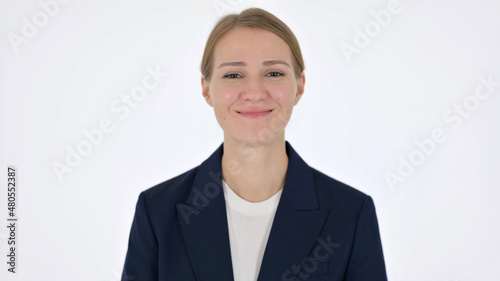 Young Businesswoman Shaking Head as Yes Sign on White Background