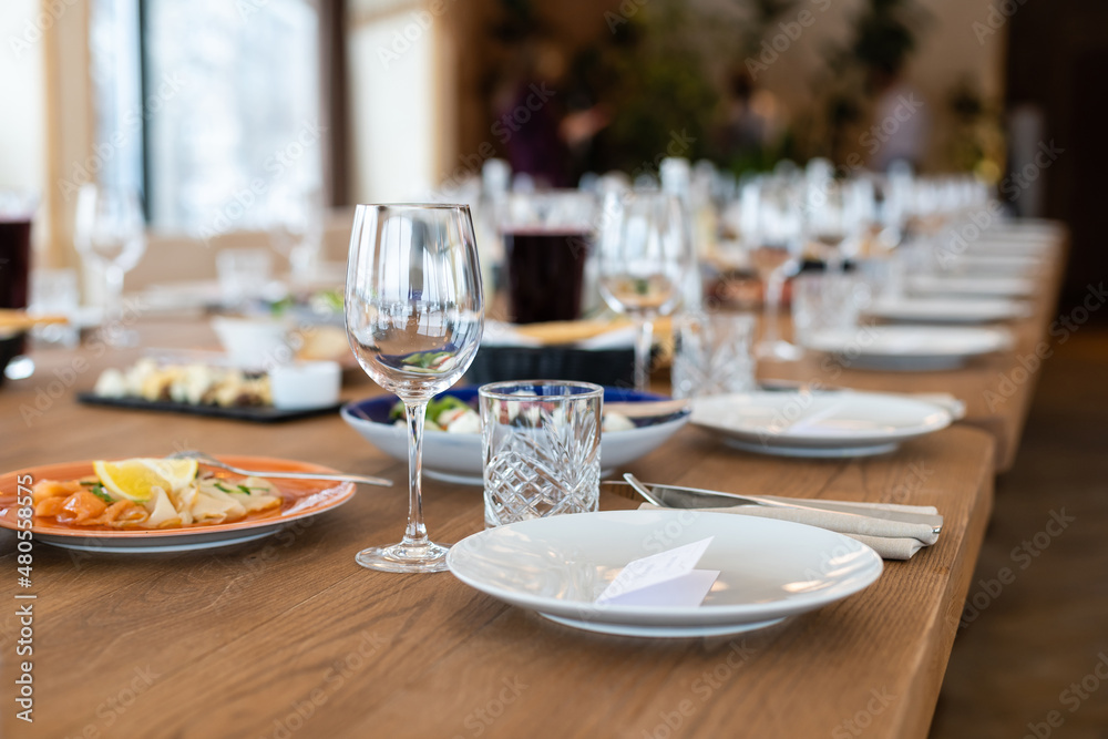 delicious dishes on the table in the restaurant. serving table. sharpness on glasses delicious dishes on the table in the restaurant. serving table. sharpness on glasses
