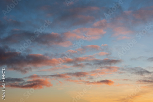 Beautiful multi colored sunset landscape image with vibrant tones for use as background or in composite images