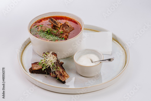 Red soup ukrainian borshch on white background