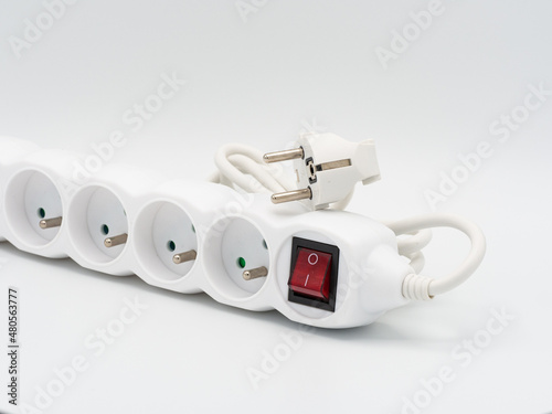 Electrical extension cord on a white background, power board
