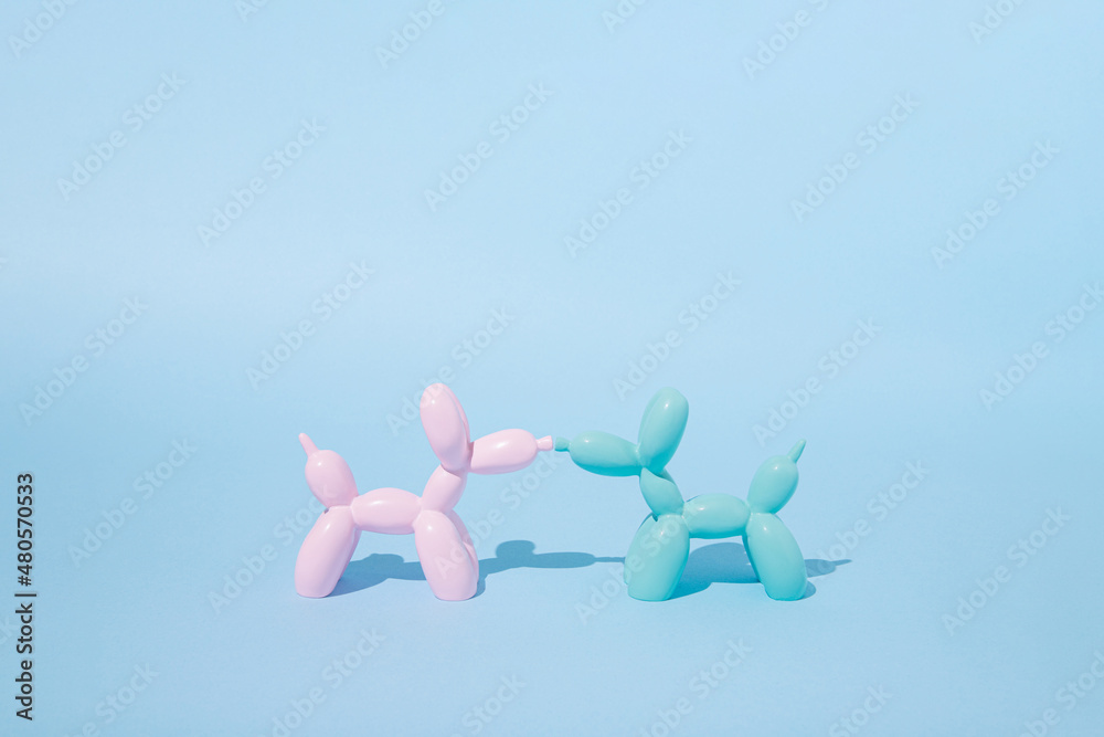 Balloon dogs in love on pastel blue background. Love card. Layout. Flat design. Minimal valentines mood. Valentine day inspiration. Love at first sight. Couple. Balloon dogs in love on pastel blue background. Love card. Layout. Flat design. Minimal valentines mood. Valentine day inspiration. Love at first sight. Couple.