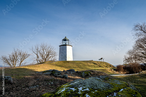 Stony Point, NY - USA - Jan 14, 2022: Wide Landscape view of the Stony Point Light, an octagonal pyramid, made entirely of stone.The oldest lighthouse on the Hudson River. photo