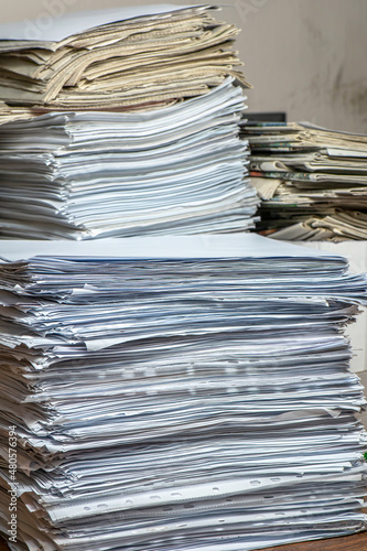 pile of paper documents in the office, paper trash, waste paper