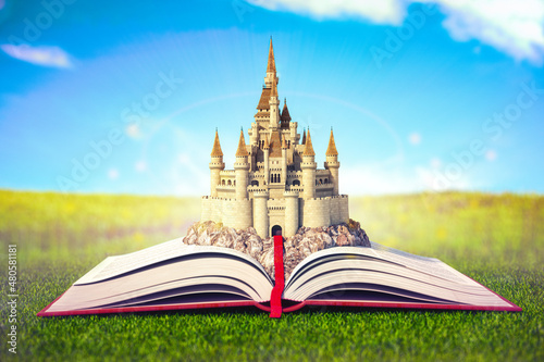 Canvas Print Open story book with fairy tale castle.