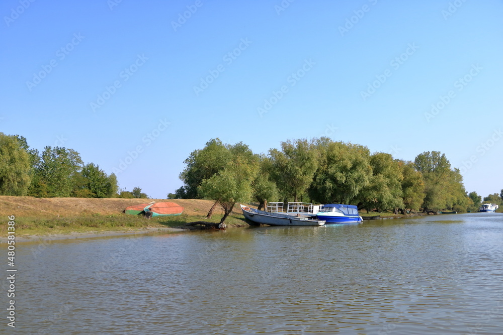 Danube Delta landscape with fishing boat in Romania