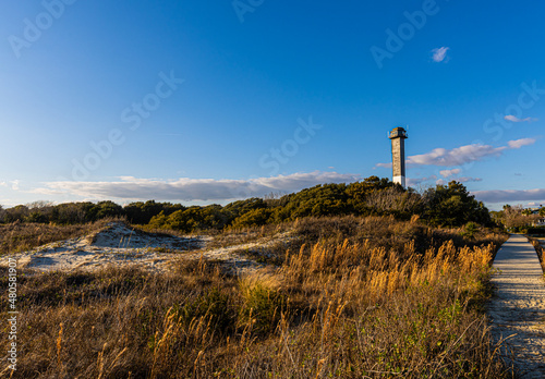 The Sand Dunes of Station 18 Beach and Sullivan's Island Lighthouse, Sullivan's Island, South Carolina, USA