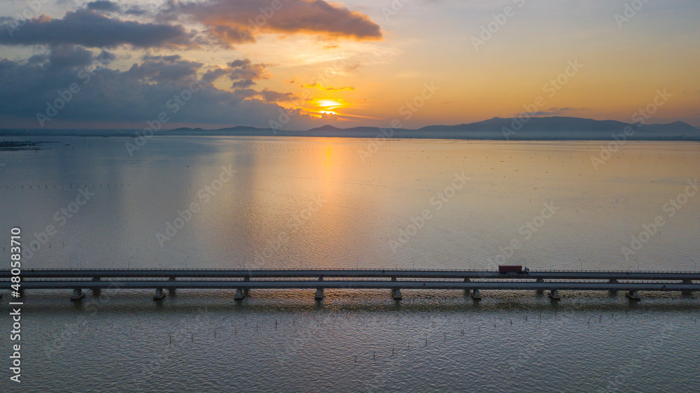 Concrete bridge over the sea in the morning
