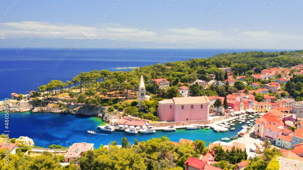 Shooting from a drone of the azure bay in town Veli Losinj on a sunny day. Croatia. Filmed in 4k, drone video.